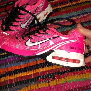 Hot pink Nike Air tennis shoes
